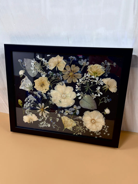 Custom Black Pressed Flower Frame showcasing beautiful pressed flowers for Custom Flower Preservation, perfect for wedding keepsakes.