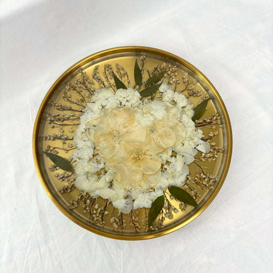 Beautiful Gold Circle Tray designed for Bridal Bouquet Preservation, highlighting colorful dried flowers encased in resin.