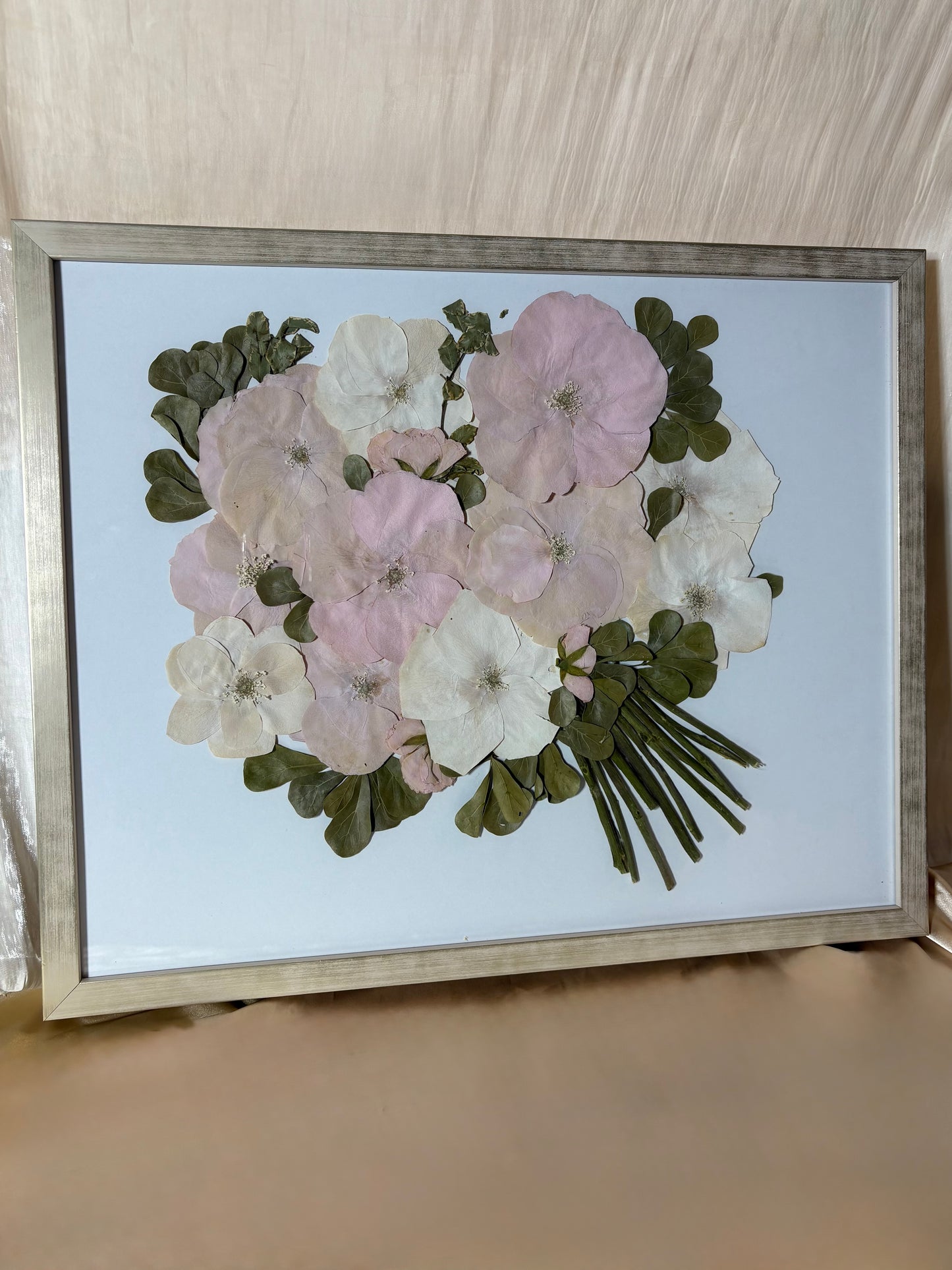 Custom Flower Preservation: Artistic representation of dried flowers in a chic Champagne Pressed Floral Frame.