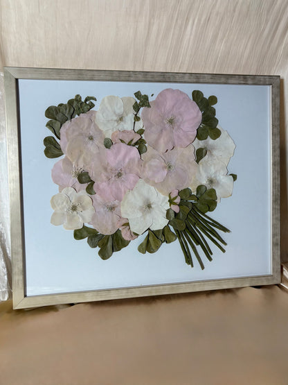 Custom Flower Preservation: Artistic representation of dried flowers in a chic Champagne Pressed Floral Frame.