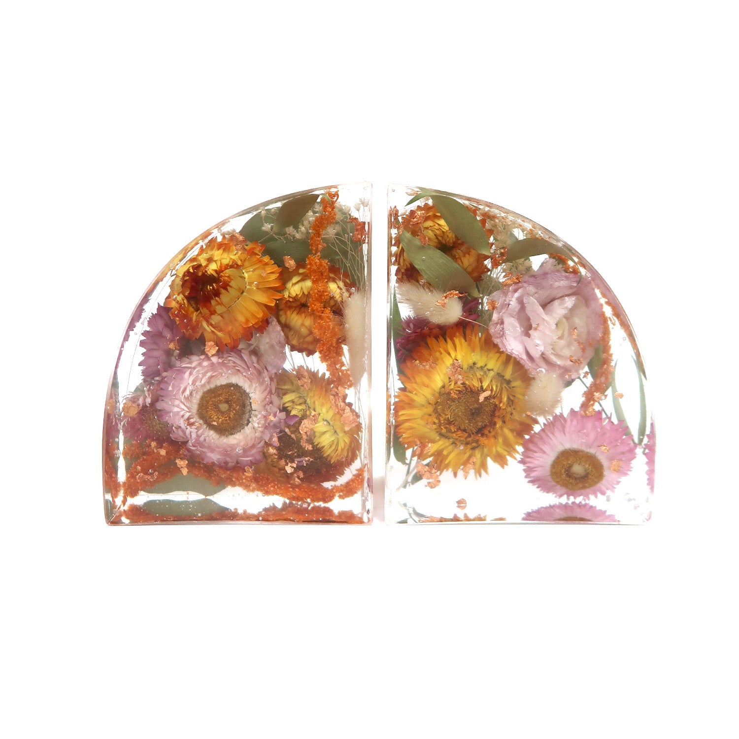 Elegant custom floral bookends made by Bloomsake, featuring beautiful dried flowers preserved in resin, each measuring 4x5 inches.
