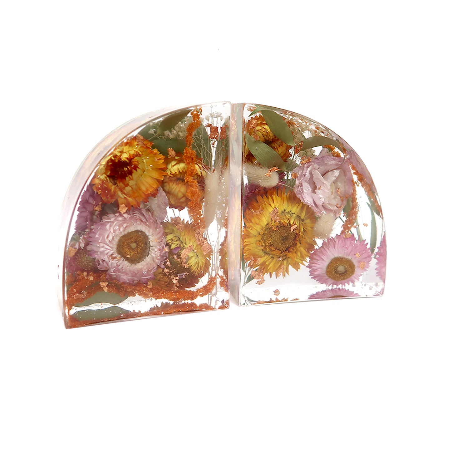 Charming custom floral bookends showcasing unique flower arrangements encased in resin by Bloomsake, perfect for any bookshelf.