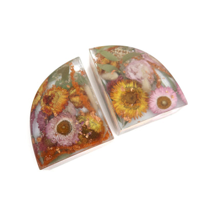 Artistic custom floral bookends designed by Bloomsake, displaying a variety of dried flowers preserved in resin, ideal for floral enthusiasts.