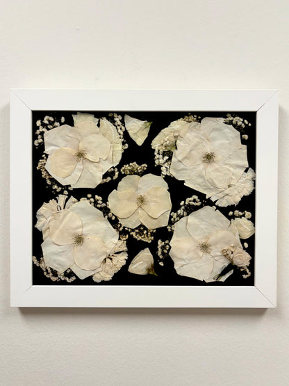 A beautiful White Pressed Floral Frame showcasing a custom preserved flower frame, designed to highlight your favorite blooms with timeless beauty.